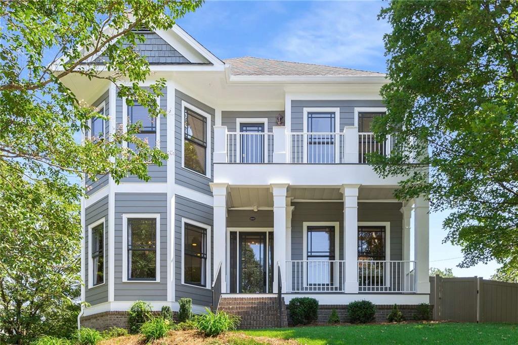 Live in the heart of Oakhurst! This lovely 4-bedroom, 3.5-bathroom traditional residence puts Oakhurst Village at your fingertips, offering a vibrant lifestyle filled with restaurants, shopping, festivals, and more. Step inside via the inviting covered front porch to a beautifully maintained interior that effortlessly meets all your needs. The main level welcomes you with high ceilings and an abundance of windows, creating a sun-soaked atmosphere. Enjoy peaceful moments in your foyer reading retreat nook or host gatherings in the elegant formal dining room. The bright kitchen, featuring white cabinets and sleek black appliances, flows seamlessly into the cozy family room adorned with window-lined walls and a wood burning (gas starter) fireplace, perfect for creating a warm ambiance. Step outside onto the new back deck made with Fortress Infinity deck boards providing a maintenance-free outdoor space to relax and enjoy your private, fenced yard.
Upstairs, the expansive master retreat beckons with a bay window sitting area, his and her closets, and a spa-like en-suite bathroom boasting separate vanities, a large soaking tub, and a glass-enclosed shower. Just outside the master, the second-story deck offers a perfect spot for stargazing or enjoying front-row views of Oakhurst festivals. Two additional sizable bedrooms with soaring ceilings and an adjoining stylish bathroom complete this level, ensuring comfort and privacy for everyone.
The lower daylight level, accessible through the main house or a private entrance, presents a versatile space ideal for an in-law or guest suite, featuring multiple rooms for various uses, along with a full bathroom and unfinished storage. Additional highlights include tankless hot water heater, hardwood floors throughout, fresh paint, new Fortress Infinity decking on all porches and decks. Embrace the best of Decatur with coffee shops and restaurants just steps away, and enjoy easy access to downtown Decatur, highways, and the airport for a quick getaway or work travel. Don’t miss the chance to make this exquisite home your own!