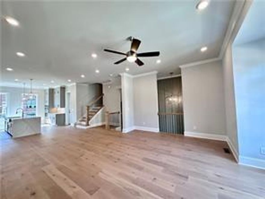 Summer of Savings with our FINAL OPPORTUNITIES at Towns on Thompson in Alpharetta.  MOVE-IN READY -Finished townhome with stunning finishes and upgraded design features is available to receive our JUNE incentive this month of  $45k ANYWAY ON CONTRACTS WRITTEN.  
Discover The Chaucer—Stunning 4-bedroom, 3.5-bath home offering luxury and modern living at its finest. Beautiful brick front exterior with brownstone-like entrance into main living level with a spacious 2-car garage with storage, back deck and private, fenced back patio space on terrace level. The grand foyer space showcases an oversized split staircases with open railing offer breathtaking views of main living level and the elevated ceiling height in the foyer is perfect for a statement chandelier fixture. This designer-curated home offers bright, open spaces with 10-foot ceilings on main level, 9 -foot on the terrace and top levels with hardwood floors throughout. The spacious main level features a painted brick linear fireplace with a cabinetry and shelving and an open living and dining spaces that flows through to a spectacular kitchen.  In the thoughtfully designed rear kitchen, you'll find stacked perimeter cabinets in willow gray and a bright white oversized kitchen island cabinet with an upgraded quartz waterfall Cambria Calcutta Goa countertops with matching quartz backsplash. The kitchen is equipped with state-of-the-art GE Café appliances and pantry —perfect for entertaining. Step onto the covered deck for outdoor dining, complete with a ceiling fan to keep you cool on warm evenings. Retreat to the upper level where an oversized owner’s suite awaits, featuring three large windows, a spacious walk-in closet with custom built-ins, and a spa-like owner’s bath. Indulge with quartz countertops, and a frameless glass spa shower under vaulted ceilings. Guests will enjoy their privacy in the opposite wing, with two additional bedrooms and a full bath, while the 4th bedroom on the terrace level offers a separate entrance, covered patio, walk-in closet, and its own full bath—ideal for guests or as an in-law suite.
Parking? No problem. Enjoy a two-car garage with space for two more vehicles on the parking pad. Best of all, the HOA takes care of everything—from landscaping to roof maintenance and more, so you can focus on enjoying life in this luxury townhome community.
Located in the highly sought-after Towns on Thompson, just steps from downtown Alpharetta and Avalon, this boutique community offers the best of vibrant, urban living. Complete and ready to call HOME —don’t miss your chance to call this stunning home yours! Optional swim amenities are available at The Foundry. Live the life you’ve always dreamed of in the heart of Alpharetta! [The Chaucer]