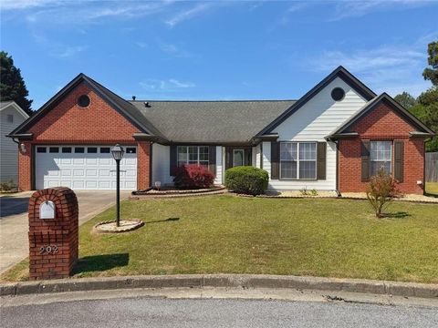 Photo of 902 Conners Cove NW, Lawrenceville, GA 30044 (MLS # 7755658)