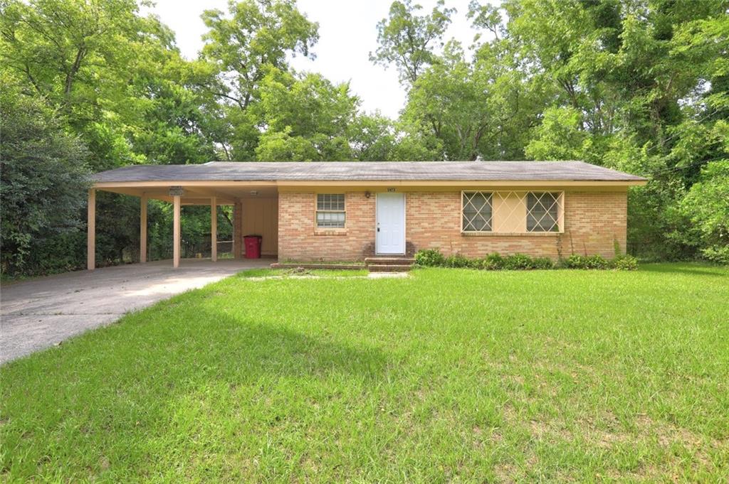 Don't Miss This 3 Bedroom, Brick Home in Great Macon Location! Hardwood Floors, Large Backyard and Easy Access to Interstate and Shopping. 2 Car Carport.