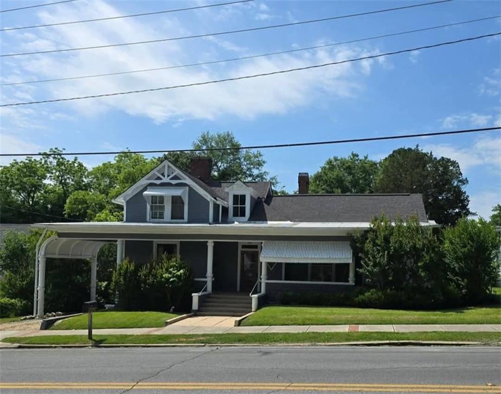Charming Historic Home with Endless Potential in Rockmart, GA. Step back in time and envision the possibilities with this character-filled 3-bedroom, 2-bathroom single-family home, boasting over 2,000 square feet of living space. Located in th heart of Rockmart, this over 100 year-old-gem sits just a short stroll from the charming downtown area and local park- perfect for enjoying community events and dining.
Featuring original hardwood floors full of vintage appeal, this home offers a rare opportunity to restore and customize a true piece of history. While the interior is ready for your personal touch and renovation vision, the exterior has already received a fresh coat of paint, setting the stage for stunning curb appeal.
Whether you're an investor, a first time homebuyer, looking for downtown office space for your business, or someone who appreciates historic charm, this home is full of potential. Don't miss your chance to create something special!