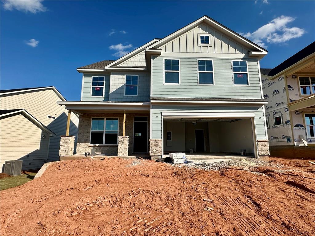 Fall in love with the Drexel by Eastwood Homes in the desirable Twin Lakes community! This three-story showstopper is thoughtfully designed with timeless details, flexible spaces, and a backyard you’ll never want to leave. The main level greets you with a private office for quiet focus, a formal dining room with a charming bay window, and a welcoming living room anchored by a stacked-stone fireplace and cedar mantel. The open breakfast room flows seamlessly to a covered back porch overlooking a spacious, deep backyard — perfect for kids, pets, or weekend gatherings. At the heart of the home, the gourmet kitchen shines with stained cabinetry, crisp white quartz countertops, gold fixtures, and eye-catching accent tile. A convenient powder bath adds extra function for family and guests. Upstairs, the second floor offers four generous bedrooms, including the primary suite with a spa-worthy bathroom featuring a luxury shower designed with a modern farmhouse feel. Two additional full baths and a versatile loft make this floor perfect for everyday living. The third floor extends your living space even further with an additional bedroom, full bath, and a versatile loft — ideal for guests, a private retreat, or a creative escape. Life at Twin Lakes is just as special, with two sparkling pools, a clubhouse, fitness center, playgrounds, and scenic walking trails. Best of all, if you have a golf cart, you can cruise right to the Publix located at the community entrance for everyday convenience. The Drexel brings together modern elegance, flexible living, and the kind of backyard space you’ve been dreaming of — a home that truly has it all!