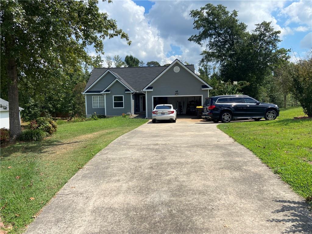 This well-loved home is in great condition and located in a wonderful neighborhood. It features hardwood and LVP flooring throughout, plus a nice walkout basement with plenty of room for recreation. Downstairs you’ll also find a full bathroom with a relaxing jet tub. A perfect blend of comfort, charm, and space, this home is move-in ready!
