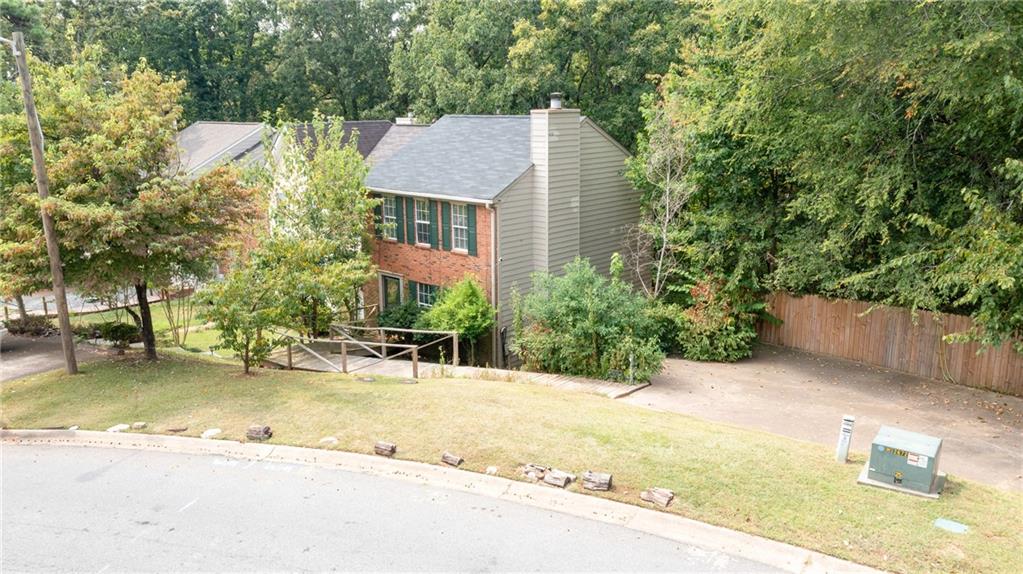 Beautifully updated 2BR/2.5BA townhome in the heart of East Cobb! This spacious end-unit features new pipes throughout, fresh paint, and new kitchen with granite countertops. Both bedrooms offer private en-suite baths, and the open living area includes a cozy fireplace. Enjoy your private back deck and wooded views. No HOA, top-rated schools, and just minutes from I-75, Truist Park, and The Battery. Great for owner-occupants or investors!