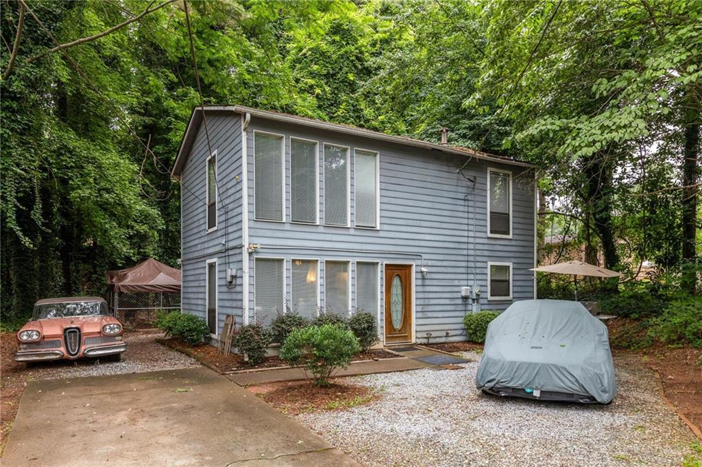 Solid opportunity for an investor or savvy first-time buyer looking to get into the market. The floor plan is smart and functional, starting with a large living room that gives you plenty of space to stretch out. The bright, eat-in kitchen has direct access to the backyard; easy for entertaining or letting the dog out. Upstairs, two generously sized bedrooms share a full hall bath, and there's a full laundry room right where you need it. Clean layout, great bones, and ready for your vision.