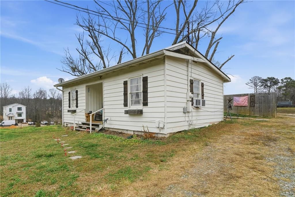 Photo of 502 Old Canton Rd Rd, Ball Ground, GA 30107 (MLS # 7700808)