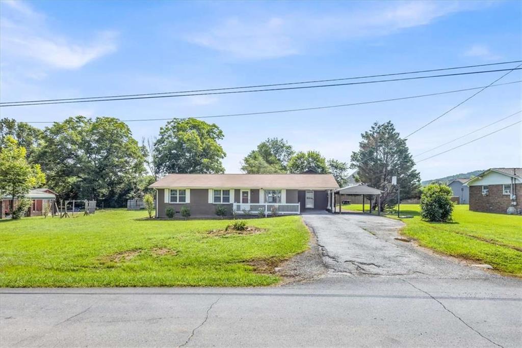 Don't miss this charming brick ranch nestled in the quiet Green Meadow subdivision! This 3-bedroom, 2-bath home features hardwood floors, an updated kitchen and bath, and a spacious screened back porch perfect for relaxing summer evenings. The level 0.46-acre lot offers mature landscaping and includes a large outbuilding - ideal for storage, a workshop, or hobbies. Located just minutes from I-75, Buc-ee's, downtown Calhoun, shopping, schools, and AdventHealth Gordon. Whether you're a first-time buyer, investor, or downsizing, this home offers a great value in a growing area!