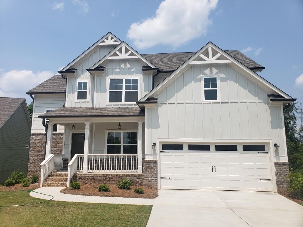 The Oakmont Home Design by Paran Homes! Beautiful new construction development at the Traditions of Braselton community located in Jefferson GA! Main level open floor plan features a formal dining room, eat in kitchen, family room and half bath. The kitchen has 42" white cabinets and granite countertops, island and stainless steel appliances. The family room features a cozy wood burning fireplace. The walk in pantry will be able to hold your latest Costco haul with no problem. Owners suite features a luxurious bathroom with marble countertops, double vanity, tile flooring and a huge walk in shower. The upstairs has two additional bedrooms with a shared bathroom, with a double vanity. The loft makes a great playroom, media room or office! The unfinished basement leaves the opportunity for storage or personalize it to fit your needs. Top of the line community amenities include a golf course, club house, fitness center, restaurant, tennis and pickle ball courts and a resort style Olympic size pool! This is resort living at its best!