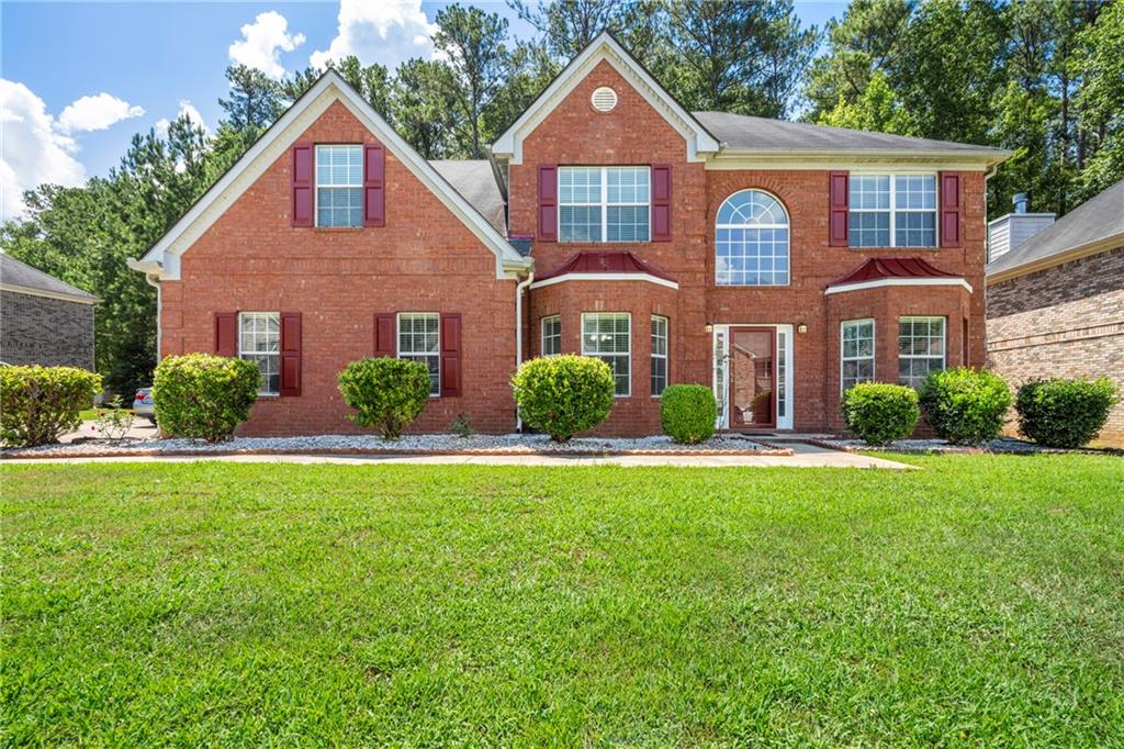FRESHLY PAINTED FOUR SIDED BRICK HOME and new LVP floors all around the house! The steps on the stairs were replaced with expensive hardwood. Main level has one bedroom with a full bathroom. Countertop kitchens and stainless steel appliances. High ceiling and open space. Upstairs features three good size bedrooms. The master bedroom is SPACIOUS and oversized! It has a huge closet. Located near interstate and lots of shopping places within 5 miles. Home is practically new! Sold-As Is. Please due your own due diligence and inspection.