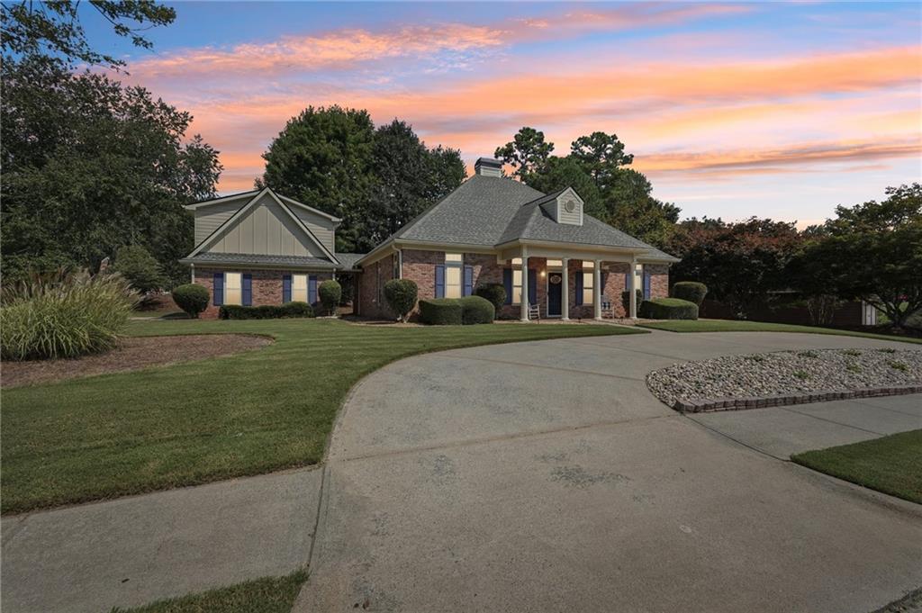 Rare, 4-sided brick ranch home in sought after Bridgemill S/D! Great corner lot with side driveway, and circular front driveway. Walk inside to a move in ready, one, level ranch featuring a very functional floorplan, tons of daylight, and 3 bedrooms on main level. Split bedroom plan with master on one side, and additional bedrooms on the other. Two living spaces to allow for multiple gathering spots. Detached garage has a fully permitted addition that could be an income producing unit, teen or in-law suite. Currently used for a professional studio and has appropriate sound proofing for this purpose. All new windows within the last two years. Roof and HVAC replaced in the last 5 years. Just minutes to 575, Lake Allatoona and both Downtown Woodstock & Canton! Check out Bridgemill's Clubhouse & Restaurant! Bridgemill offers many additional Optional amenities including 18-hole golf course, hard-court & clay tennis court, pickle ball, volleyball, basketball courts, playground/pavilion, a 2-acre pool with snack bar & fitness center. These are Optional amenities that you can join!