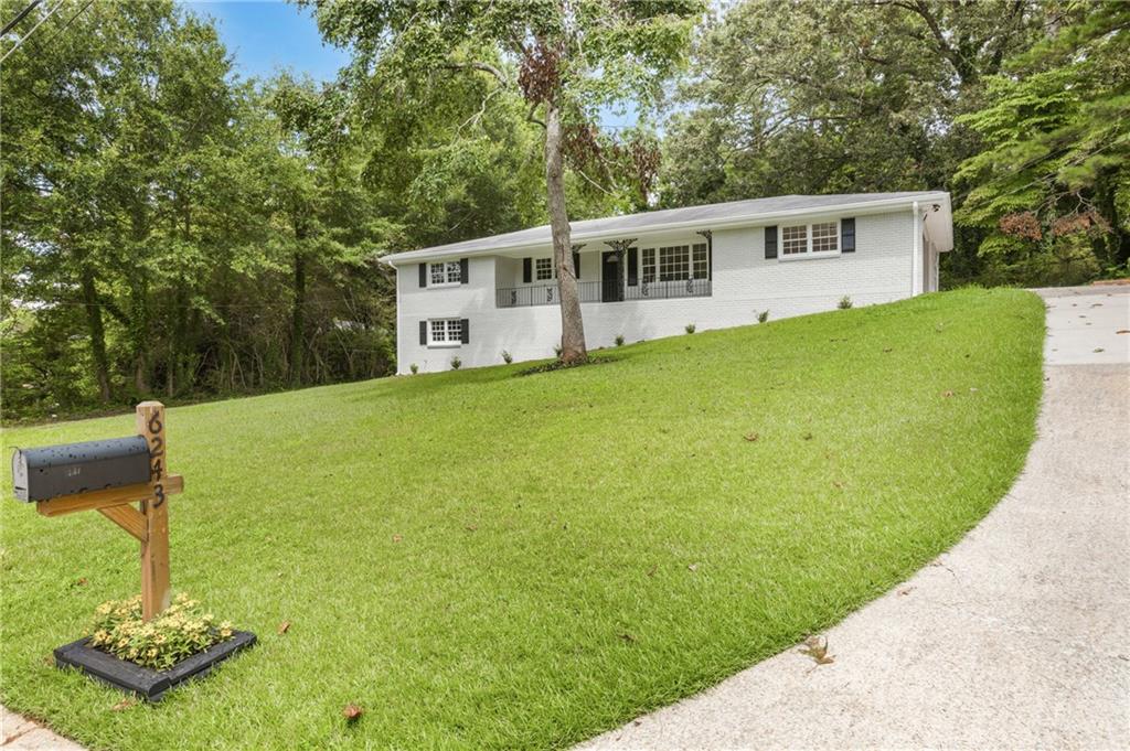 Freshly Renovated & Full of Charm!
Where classic brick meets modern updates in the heart of Mableton. This two-story ranch offers 3 spacious bedrooms, 2 fully renovated bathrooms, Plus 2 versatile bonus rooms —perfect for a home office, gym, media room, or guest space!
Inside, you'll find updated flooring, fresh paint throughout, a fully remodeled kitchen with brand-new Whirlpool appliances, upgraded cabinet hardware, and stylish lighting. Both bathrooms have been completely renovated with sleek new finishes. Even the basement laundry area got a functional upgrade! Plus, enjoy year-round comfort with a brand-new HVAC system installed in 2024.
Step outside to fresh Repose Gray paint, professionally pressure-washed brick and driveway, newly installed boxwood shrubs, and a lush backyard ready for entertaining or relaxing. The attached two-car carport features newly finished epoxy flooring, and the separate side-entry basement garage offers extra space for parking, storage, or your next DIY mission.
No HOA, great curb appeal, and easy access to I-20 and I-285—this one’s move-in ready with all the extras.
Don't wait—schedule your private tour today and see everything this updated home has to offer!
***Qualified buyers can get in with just 1% down and receive up to $7,000 toward their purchase with a special lender credit!***