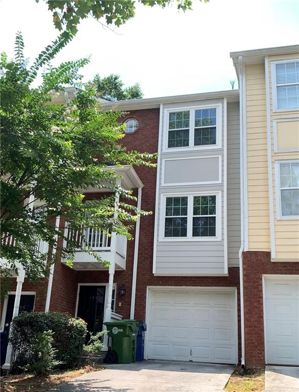 Welcome to this spacious 2 bedroom, 2.5 bath townhouse in Mechanicsville. RENT INCLUDES ALL UTILITIES, INTERNET, WATER AND GARBAGE. Traverse the stairs to the first floor to find the kitchen, dining room, half bath, family room with hardwood floors and a fireplace, and balconies on the front and back. The next level boasts 2 bedrooms with an ensuite bathroom for the perfect roommate situation. Enjoy parking in the driveway and the street. Conveniently close to highways 75/85 and I20, shops and restaurants in Summerhill, Grant Park and the Atlanta Zoo; and about a mile from the Beltline. Call for a viewing today!
