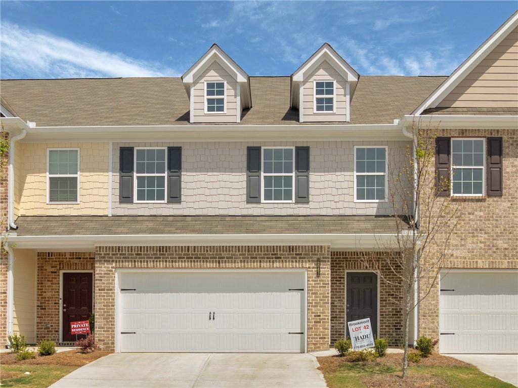 This New Construction Townhome is designed by Hadi Builders, a quality custom Builder, with emphasis on modern living with a focus on comfort, style and convenience. The Chloe Plan is sure to impress your family and friends as they walk into this beautiful home with open concept living on the main level. The chef's kitchen comes equipped with stainless steel appliances, granite countertops and pantry. Your primary suite provides all that you need for rest and relaxation. The primary bath features double vanity, over-sized soaking tub and large walk-in closet. Spacious secondary bedrooms complete the upper level. Close to shopping, schools and just minutes to 1-20 and Hwy 166, you will find everything you need in this beautiful, swim, tennis community that also features a gym and clubhouse. The model is open 7-days a week. Monday - Saturday from 11am - 6pm, Sunday from 1pm -6pm. The Builder is offering a $10,000 incentive with the preferred lender so schedule your showing today! Stock photos of the interior.