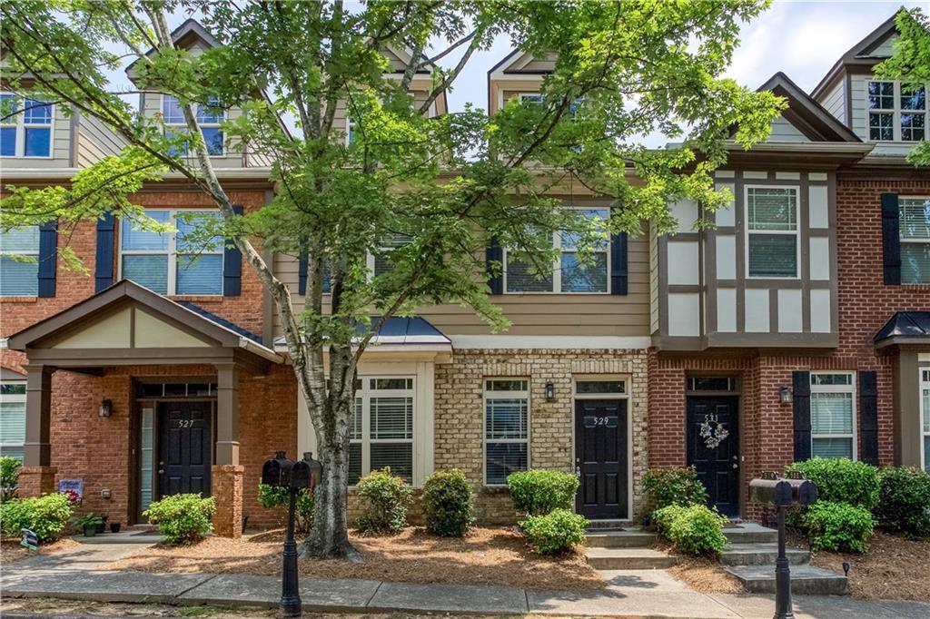 Move on in!! Check out this Townhome with newly painted interior trim, new carpet and brand new stainless appliances! Three spacious bedrooms upstairs and a nice sized living space and kitchen. Location is convenient to I-575, and Downtown Woodstock with lots of Entertainment, Shopping, Restaurants, and more.