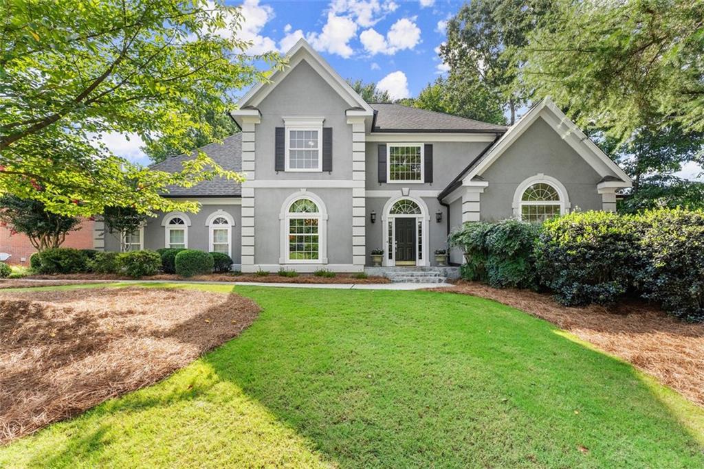 Welcome to your dream home in the heart of Johns Creek, GA—recently named the #1 Best Place to Live in the U.S. by U.S. News & World Report! This beautiful 6-bedroom, 4.5-bath traditional home has everything you’ve been searching for—spacious living, modern updates, and a community that truly feels like home.
Step inside and you’ll immediately notice the generously sized bedrooms, perfect for growing families, guests, or even that home office you’ve been dreaming of. The heart of the home—the kitchen—has been completely updated with a sleek, modern design featuring quartz countertops, stainless steel appliances, a large center island, and stylish cabinetry. It’s a space that’s just as functional as it is beautiful.
On the main level, you’ll fall in love with the remodeled primary suite bathroom—think spa vibes with a large walk-in shower, double vanities, designer finishes, and calming tones that make unwinding at the end of the day a true pleasure.
But this home offers more than just great interiors—it’s part of a vibrant swim & tennis community where neighbors become friends. Whether you're cooling off at the neighborhood pool (home to an active swim team), hitting the tennis courts, or relaxing in the green space and playground areas, there's always something fun to do just steps from your front door.
And of course, you’re in Johns Creek—a city known for its top-rated schools, low crime, beautiful parks, and unbeatable quality of life. It’s a community that truly has it all: excellent dining, shopping, top-notch healthcare, and even 13.5 miles of Chattahoochee River access for outdoor lovers.
This home checks all the boxes for modern comfort and lifestyle convenience in one of Georgia’s most sought-after locations. Come see it in person—you’ll instantly feel right at home.
Seller will provide 2 year Home Warranty upon closing.