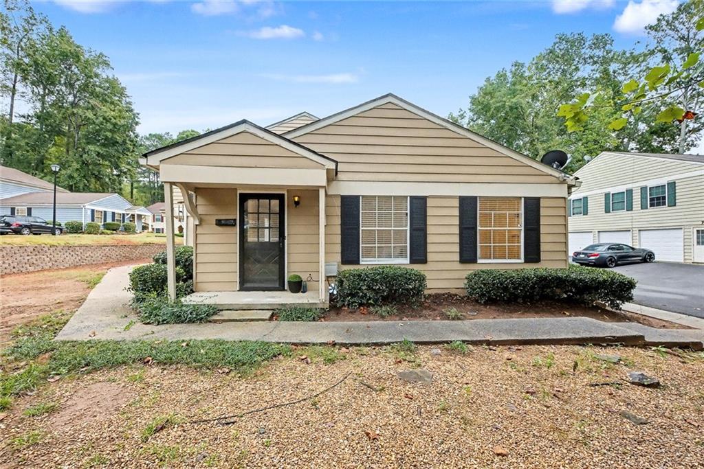Welcome to this beautifully updated ground-floor condominium in the desirable Bellemeade Commons community of Marietta. This bright and open 2-bedroom, 1-bath home features a spacious, inviting floor plan filled with natural light and stylish updates throughout. The interior showcases beautiful light-toned, wood-look flooring throughout that adds warmth and a modern touch to every room. The kitchen offers white cabinetry, ample storage, and convenient garage access, along with a view to the family room for easy entertaining. Enjoy the convenience of a parking pad for two cars near the front door and a private one-car garage, providing plenty of space for everyday living. Recent updates include fresh interior paint, updated lighting, blinds, and modern fixtures throughout. This home is all on one level, completely private, with no shared walls and no one above, making it perfect for a first-time homebuyer or someone looking to downsize. Located just minutes from Marietta Square, Downtown Smyrna, and The Battery Atlanta, this move-in-ready home offers modern comfort, convenience, and timeless appeal!
