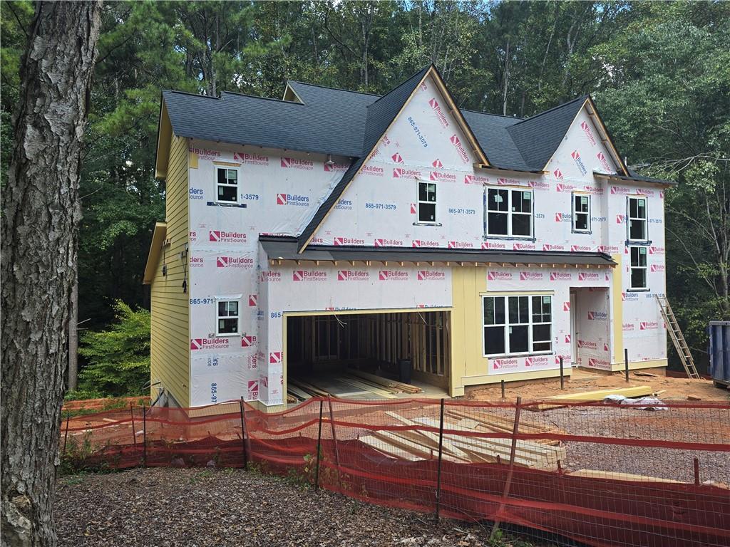 New Construction - Modern farmhouse plan that has 4 Bedrooms & 4 Full Bathrooms. King Springs Elementary. Property features an open kitchen, Quartz Counter tops, Tile back splash, SS appliances, double oven, gas cook-top, Large Island w/ views to the family room. 10 foot ceilings with 8 foot tall doors on the first floor, full bed/bath on the main level. Large owner's suite and private owner's bath with large walk-In closet, freestanding tub. Laundry on the upper level. Huge covered deck overlooking your private back yard. Full unfinished daylight basement. Large two car garage plus private back yard! Walking distance to the Silver Comet Trail and North Cooper Lake Park. Quiet neighborhood, easy highway access, and incredible price!!! Southern Living Custom Builder.