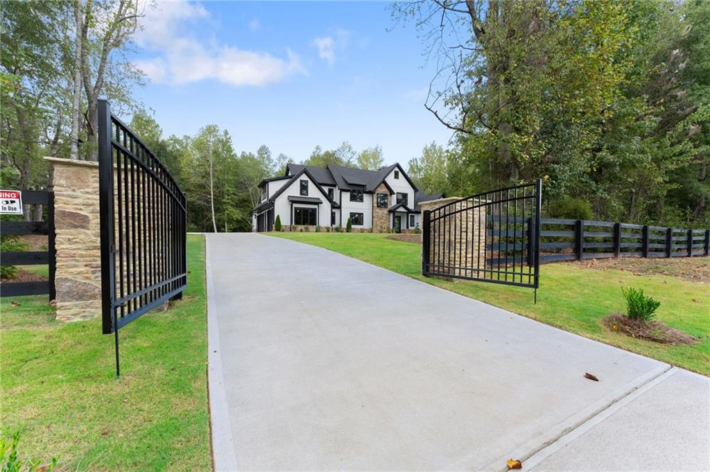Photo of 5697 Ball Ground Road, Ball Ground, GA 30107 (MLS # 7840834)