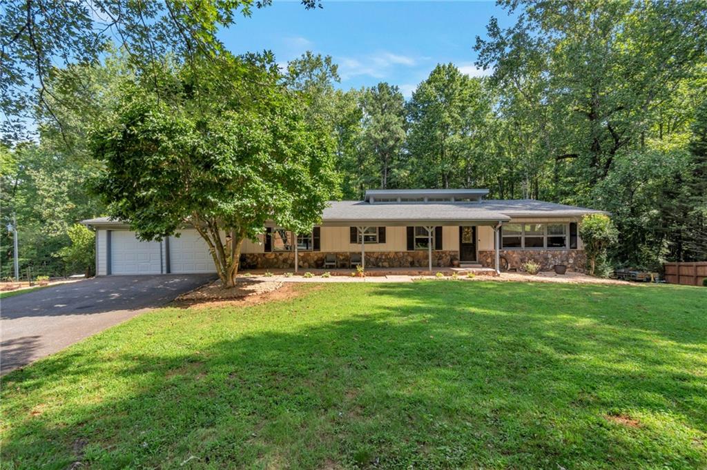 Super Rare 2.8-Acre Ranch on a Cul-de-Sac with No HOA! Welcome to this thoughtfully updated single-family ranch, perfectly nestled on a super rare 2.8-acre lot with minimal elevation changes—ideal for outdoor living, future projects, or simply enjoying wide-open space. Located on a quiet cul-de-sac with no HOA, this property gives you the privacy and freedom you’ve been searching for. Inside, the home has been beautifully updated with modern finishes, offering a bright, stylish, and comfortable living space. Downstairs, the unfinished basement provides endless possibilities—whether you need extra storage, a workshop, or want to add valuable square footage in the future. All of this, plus a prime location with easy access to Alpharetta, Milton, and Cumming—you’ll enjoy both convenience and tranquility. This house WILL NOT LAST LONG! Don’t miss your chance! PHOTOS COMING SOON!!