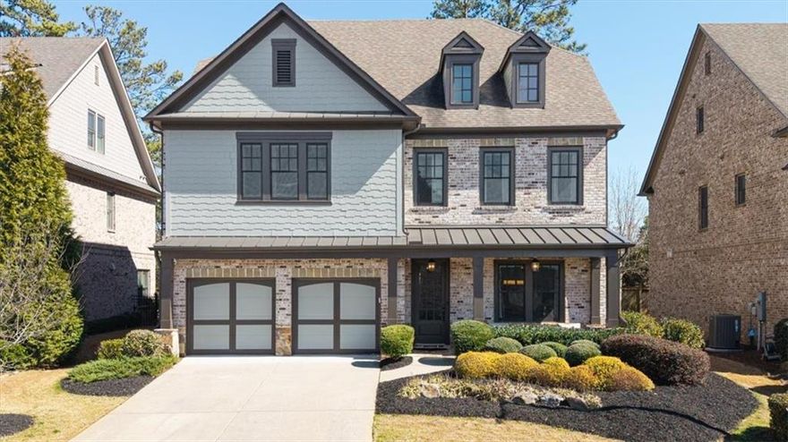 Live TALL in the sought after East Cobb Cobblestone Manor swim and tennis community, located in the premier school district of Walton High School. Welcome to this meticulously maintained, move-in ready home with the In-Law Suite on the main level. Situated on one of the freshly landscaped lots in the community, this home provides plenty of open living spaces for comfortable living, including multiple living areas. The living room with fireplace and gorgeous built ins and plenty of streaming light is an exceptional space. The heart of the home features a large gourmet kitchen complete with modern appliances, an abundance of cabinetry and an oversized island with a spacious breakfast dining area. This is the perfect open floor plan for entertaining guests. A cozy porch and grilling deck, overlooking the private backyard which offers plenty of room; this porch is a perfect space to relax year round. The owner’s suite on the second level features a spacious layout with sitting area. The owner’s bath is impressive with plenty of cabinetry and counter space along with the spa tub and oversized shower with glass doors. Conveniently located adjacent to the owner’s suite bath area, you will appreciate the generously-sized walk-in closet with custom built-in’s. On the second level, the home features three well-designed en suite bedrooms with walk-in closet and their own private baths. Enjoy the community’s exceptional tennis and pool amenities. Located in a prime East Cobb area with easy access to major highways, including 400, 285 and 75, along with numerous shopping and dining options. Your new lifestyle awaits in this exceptional community. Schedule your showing today!  The interior of the home was recently painted on 5/19/2025!