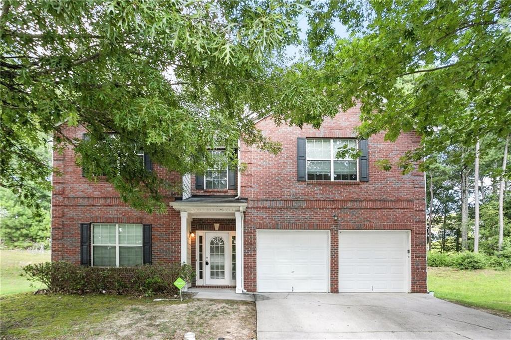 Tucked in a quiet cul-de-sac in the Poplar Falls neighborhood, this two-story home offers a smart layout with all three bedrooms upstairs and plenty of room on the main floor to entertain or relax. The living room features a fireplace and flows into an eat-in kitchen with a view to the family room. A separate dining room gives you extra flexibility for hosting. The primary suite includes a soaking tub, separate shower, and walk-in closet. Outside, enjoy a flat backyard and attached two-car garage. Located minutes from shopping, schools, and I-20 access.