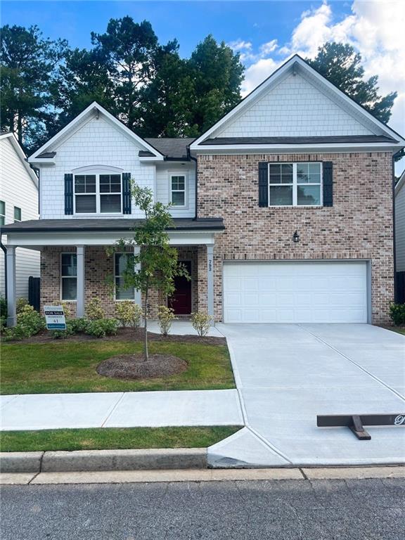 BRICK FRONT - Quick Move-In Home - NEW CONSTRUCTION!!! UP TO 16K FROM SELLER PLUS UP TO 2% FROM LENDER!!! EXCITING OPPORTUNITY IN ATLANTA! Discover the allure of Lot 41, featuring the magnificent "CLIFTON C" design with a sprawling front porch, offering an impressive open floorplan. This carefully curated homesite promises an array of exceptional features, boasting 4BR's, 2.5BA's, and a thoughtfully designed layout. Main Level:: Experience the WOW-Factor of an Open-Concept living space as you step into the foyer adorned with Crown Molding. This level includes a versatile dining room/flex room, a generous coat/storage closet, and a gourmet kitchen featuring 42-inch White Cabinets with Crown Molding, Granite Countertops, Moen faucets, a stylish Tiled Backsplash, SS Appliances, with an Oversized Island, and a spacious Walk-in Pantry. Recessed lighting and luxurious LVP flooring enhance the contemporary aesthetic. 2nd Level:: Unveils a HUGE Oversized Owner's Suite with a tray ceiling, Double Vanity, a Separate Tub and Shower, and an Expansive Walk-in Closet. Each Secondary has a Walk-In Closet, Vaulted Ceiling. Model Home Open Monday 12pm-6pm, Thursday-Saturday 11am-6pm and on Sunday 1pm-6pm. Tuesday/Wednesday by appointment only. COME OUT AND TAKE YOUR PRIVATE TOUR - RESERVE AT SOUTH RIVER GARDENS. Stock Photos Used. Actual Home May Vary.