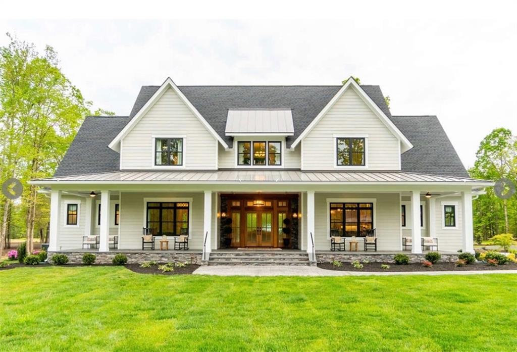 AMAZING custom Modern Farmhouse design in the established Sandy Creek golf course community in North Jackson County, close to Athens. Massive front porch leads to a mahogany double front door entry and open concept plan with living room open to the large gourmet custom kitchen with quartz counters, pot filler, large island, double ovens huge pantry and dining area. A private office space and large laundry room are close by but tucked away. The living space also offered wood style flooring and recessing crown molding lighting. Primary suite on main provides peace and quiet with a luxury bath offering a large tiled shower with rain shower & jets, bidet, and a separate stand-alone tub. The sprawling upper level provides a loft area, 2 bedrooms, 2 full baths, and 2 flex areas.