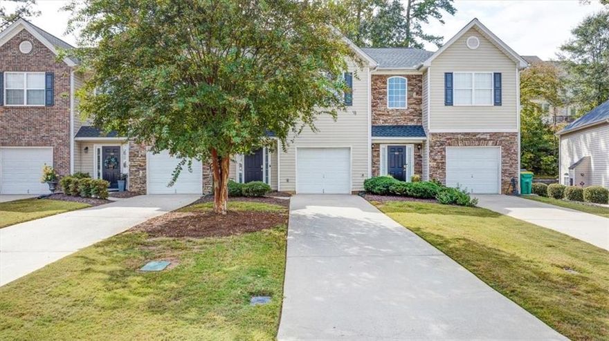 Welcome home to this 2-bedroom, 2.5-bath townhome that makes life in one of Atlanta’s most loved suburbs refreshingly easy. Located less than 15 minutes from Downtown Woodstock—even without a car—you’ll have local coffee shops, restaurants, and community events right at your fingertips. Inside, enjoy a bright open layout designed for everyday comfort and entertaining. The main floor flows easily from kitchen to living space and out to a private patio for morning coffee or evening unwind time. Upstairs, two spacious bedrooms each feature their own full bath, offering privacy and flexibility for guests, roommates, or a home office. With low-maintenance living and community amenities that take care of the details, this home gives you more time to actually enjoy the Woodstock lifestyle—trails, live music, farmers markets, and a true sense of small-town charm. Modern convenience, walkable charm, and unbeatable access—this is Woodstock made simple.