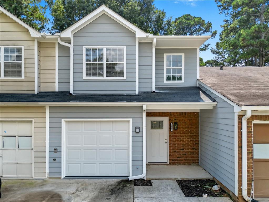 Welcome to this beautifully renovated 3 bedroom, 2.5 bathroom townhome offering 1,559 square feet of modern living space with NO HOA. From the moment you arrive, you'll notice the attention to detail, with a brand new roof, new A/C, and a new water heater providing peace of mind for years to come. Inside, fresh paint throughout complements the open floor concept, where a huge living room with a ceramic accented fireplace creates a warm and inviting centerpiece. Modern light fixtures and recessed lighting brighten every corner, while new LVP flooring flows seamlessly through the main areas and ceramic tile enhances the kitchen and baths. The kitchen has been completely renovated, showcasing granite countertops, stainless steel appliances, and a contemporary design perfect for both cooking and entertaining. Upstairs, the master suite offers a true retreat with a fully renovated bathroom featuring ceramic tile, a spacious walk in closet, and ample room for comfort. The additional bedrooms are generously sized with great closet space, and the hallway bathroom has also been beautifully updated with modern finishes. Convenient laundry is located in the hallway for easy access. Step outside to enjoy a good-sized backyard and patio, ideal for relaxing or entertaining. The home also features a one car garage, adding practicality to its many upgrades. Nestled in a very quiet neighborhood, this property offers both peace and convenience, just minutes away from Chapel Hill Park and close to your favorite restaurants and stores. Its central location makes it a perfect starter home or a great fit for families looking for comfort and accessibility. Don't miss the chance to make this move in ready home yours! Schedule your visit today!