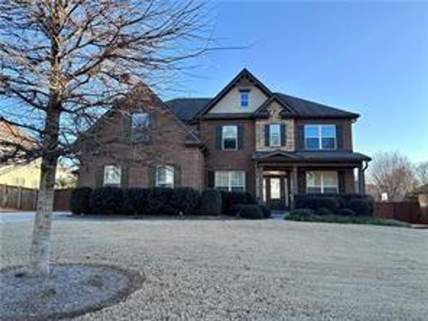 This 2016 built Craftsman Home is absolutely move in ready. Situated on a .27 acre level, fenced rear yard within the swim community of Woodstock’s Hickory Manor, the location offers close proximity to schools, shopping and dining. The two story grand foyer and spectacular interior provides exceptionally scaled entertaining and gathering spaces. The Kitchen is truly the hub of this home with its ample cabinet and counter space, an Island with Breakfast Bar,  stainless appliances, Whirlpool 4 door refrigerator, and a Walk-In Pantry and mud room/drop zone to the garages. With open access to the Breakfast Room and the sun-lit Great Room the spaces are highlighted with cabinetry and shelving flanking the stacked stone gas log fireplace, and a glass door accesses the covered rear patio with corner fireplace, ceiling fan canned lighting and TV mounted over the mantel. Completing the Main Level is the 5th Bedroom that is a standout and full bathroom. Upstairs the spacious Primary Suite is a perfect refuge. The vaulted spa bathroom offers a wall length double vanity, an oversized shower, soaking tub and private water closet. The walk-in closet boasts shelving and racking to keep everything accessible and organized. The Laundry Room is also conveniently located on this level with access from the main hallway or the Primary Bedroom. Bedroom 2 with private bathroom, and Bedrooms 3 and 4 that share a center bathroom accessed from both rooms. A very large Bonus Room creates useful flex space for  media room or an intimate living area.
Note: Tenant responsible for HOA Dues will be prorated for the rest of 2025 has they had currently been covered by owner.