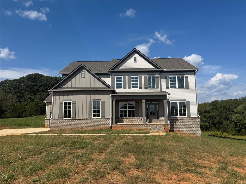 Offering $10,000 in incentives. 1 of 5 Homes (2 sold 3 remaining). Beautiful New Construction. Farmhouse Style, Covered Front Porches, Large Private Lots, No HOA, Three Car Garages. Standard Features Include ten Foot Ceilings on Main and nine foot Upper Level, CAT 5 for Telephone, RG6 for Cable Connectivity in Family Room and master Bedrooms. Modern Farmhouse Trim Package, Dining Room with custom trim, Engineered Wood flooring in Foyer, Kitchen, Breakfast, and living room. Satin Hardware and Light Fixtures. Large Master Bedroom Features with Tub; Separate Shower with Clear Glass Door, Double Vanities, Walk in Closet and Floor and Wall Tile, Kitchen Features Quartz Counter Tops, Tile Backsplash, Recessed Lights, Pantry wood shelving and Whirlpool stainless steal Appliances to Include; 36 Inch Cooktop, Dishwasher, double-oven with Microwave Kit and Vent Hood. Generous Size Secondary Bedrooms. -Must schedule with the listing agent to walk home and property. Home is roughly 30-45 days from completion.