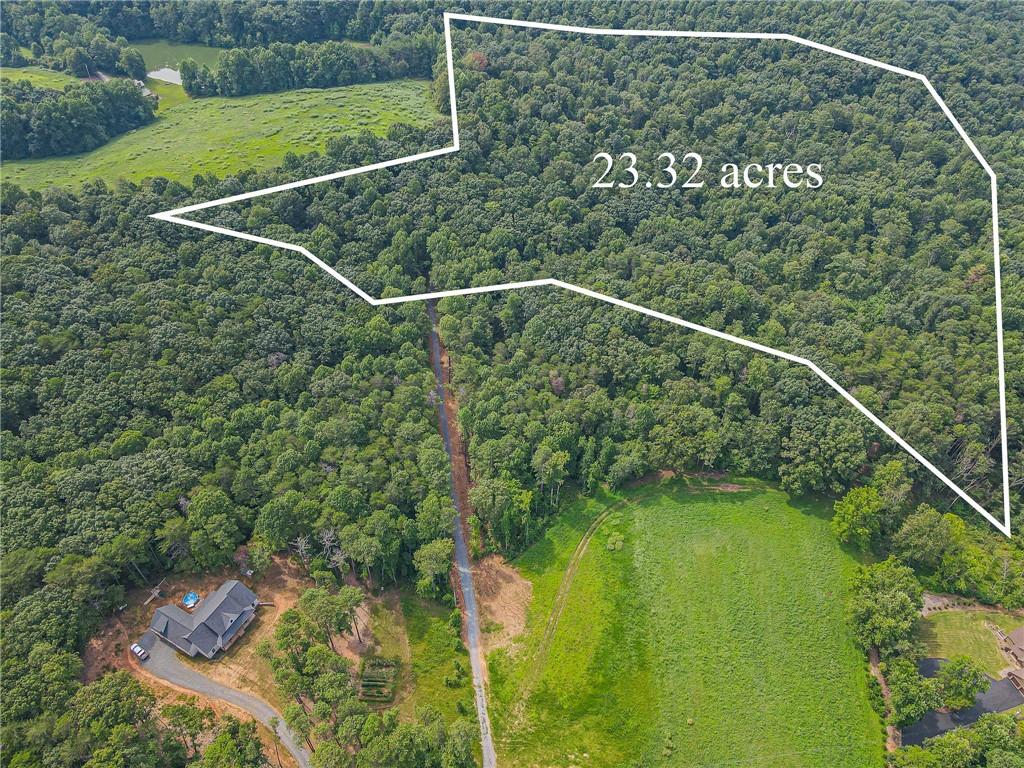 23.32 Acres of Beautifully, Untouched, Rolling hills in the heart of Wine Country. This property has enough acreage for your family compound or private mountain retreat. Minutes away from Chateau Meichtry, Buckley and Ott Farms Vineyards. Get your fresh food from Mountain Valley Farm Store and Harvest Moon Farms, which are right down the road. Whether you're an Outdoor Enthusiast who loves to fish, kayak and go tubing, or you love great shopping and dinning this property is in a prime location to do it all. Within 10 minutes from downtown Ellijay this property has minimal restrictions. Be the next owner of this great opportunity, come tour today!! Trusted Lender Homeowners Financial Group Casey Simmons.