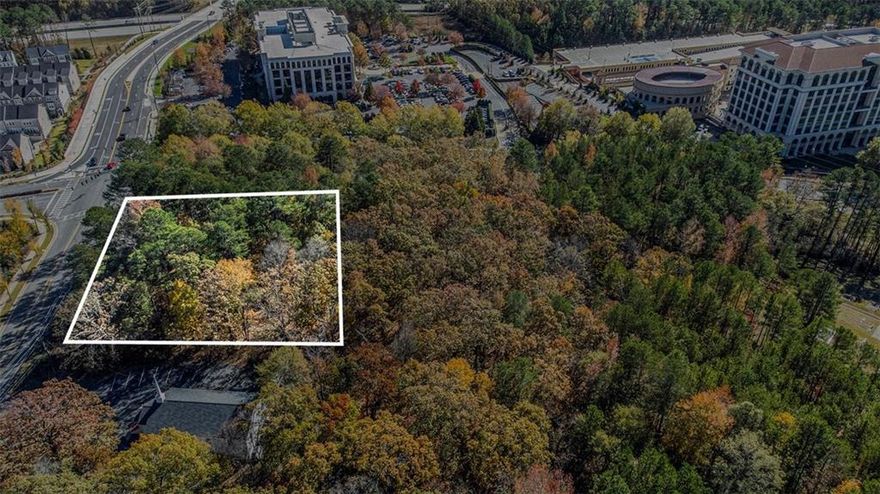Prime Development Opportunity in Alpharetta. Discover a rare investment opportunity in the heart of Alpharetta, a vibrant community. Previously home to "The Bailey" development project, this site has over 1 million in predevelopment work completed, giving interested developers the opportunity to either pick up where the project left off or create a new vision entirely.

This prime 4.72-acre parcel, located at the coveted corner of Kimball Bridge Road and Northwinds Parkway, is just steps away from the upscale thriving live-work- play Avalon shopping and dining district. 
Currently Zoned O-I ensuring flexibility for office, institutional, or mixed- use projects. This property has already received preliminary approval from the City of Alpharetta for a hotel and spa wellness center, making it an ideal choice for developers looking to capitalize on the area's high demand for hospitality, retail, luxury accommodations and wellness services. With its strategic location in a bustling area, this land offers exceptional visibility and accessibility, ensuring a steady flow of potential customers. 

Don’t miss this chance to invest in a rapidly growing market with endless possibilities. Whether you're looking to build a premier hotel, a wellness retreat, or a combination of both, this property is the perfect canvas for your vision. Seize this opportunity to create a landmark destination in one of Georgia's most sought-after areas.
