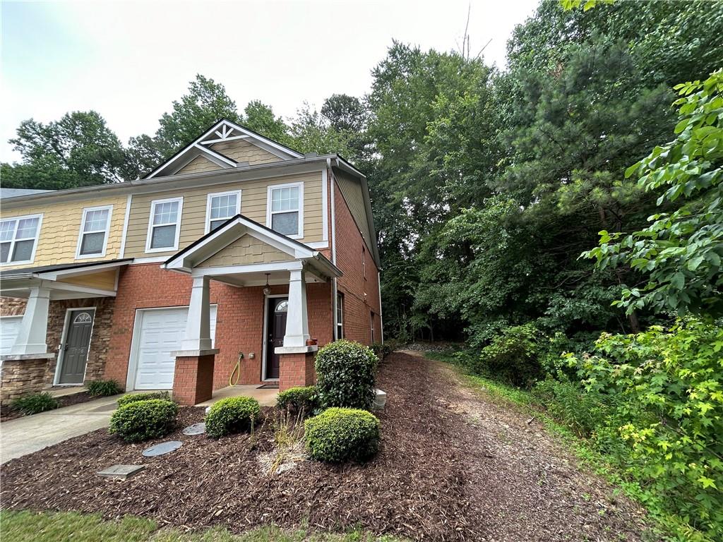 Charming End-Unit Townhome with Dual Master Suites in a Prime Location! This cozy and well-maintained property features two spacious master suites, each with its own full bath, double vanity, and walk-in closet—perfect for comfort and privacy. Enjoy your morning coffee while taking in the view from the bright family room, thanks to its end-unit location. The home also offers a huge walk-in laundry room and a fenced private patio, ideal for relaxing after a long day. Recent updates include a new roof replaced by the HOA in 2023, as well as a brand-new microwave and dishwasher. The community offers great amenities, including a swimming pool and playground. Parking is easy with extra spaces available right in front of the property. Unbeatable location! Just minutes from Hwy 316 and I-85, and conveniently close to dining, shopping, and Sugarloaf Mills.