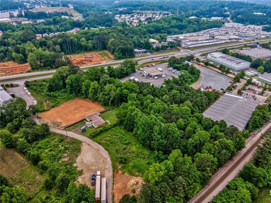 These are two adjoining lots- 1394 Asberry Dr, NW and 0 Cobb Pkwy in Marietta.
 Vacant lots, no structures. Combined acreage of 2.8 acres. 
Parcels 16086600130 and 16086600190