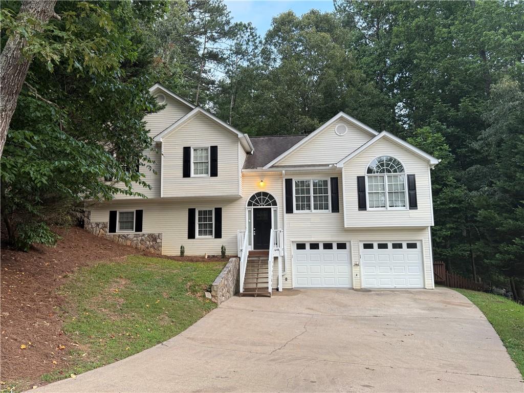 Welcome home to 504 Matthew Dr, a completely renovated 4-bedroom, 3-bathroom finished basement, fenced backyard, cul-de-sac home in the desirable Oakridge Estates neighborhood. Home Features: Large Family Room with a cozy fireplace, New flooring, inside/outside paint throughout along with new garage doors. Two story Foyer welcomes you to a rot iron staircase. Kitchen features expanded design with new slow-close white shaker cabinets, new backsplash tile, and Quartz countertops, Formal Dining Room available for entertaining, Master Suite with a walk-in closet and en-suite bath featuring a garden tub, separate shower, and double vanity, Finished Basement includes a 4th bedroom and bonus/rec room and Full bathroom. Nice size back deck highlights your Fenced Backyard for privacy and outdoor enjoyment, 2-Car Garage just had flooring refinished. Close to top-rated schools and minutes from Wellstar Hospital, Easy access to shopping, dining, and major highways.
