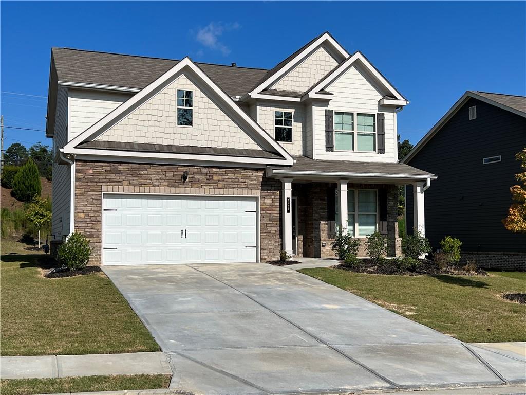 This beautiful home features an open floorplan, 42" Designer Wood Cabinetry with Crown Molding, Soft Close Drawers and Doors on all Cabinetry, Granite Countertops with Stainless-Steel Sink and Appliances, Walk-in Pantry, Kitchen Islands, 9’ Ceilings on Main, Stained Oak Hand Rail with Metal Spindles Hardwood Flooring on Main Level Living Areas, All Tiled Floors in Full Baths, Crown Molding in Master Bedroom and so much more.