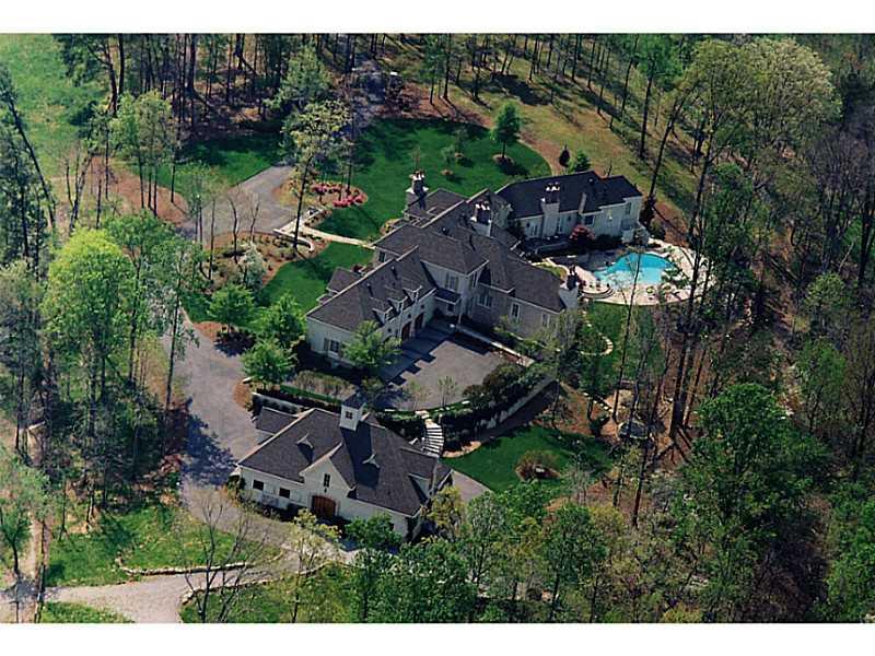 'VIVE ALLURE FARM' is a 50+ acre equestrian estate which offers a manor style home with 3 masterfully finished levels that include a master suite with private office; guest suite on main; finished terrace level with wine cellar & movie theater. The equestrian lover will appreciate the state-of-the-art barn w/6 stalls; two riding rings & multiple paddocks. Outdoor living is easy & enjoyable with an outdoor kitchen/grilling station; salt water pool; organic gardening and trail riding. The property is complete w/ heliport/caretaker quarters, gated entry & 4-board fencing.