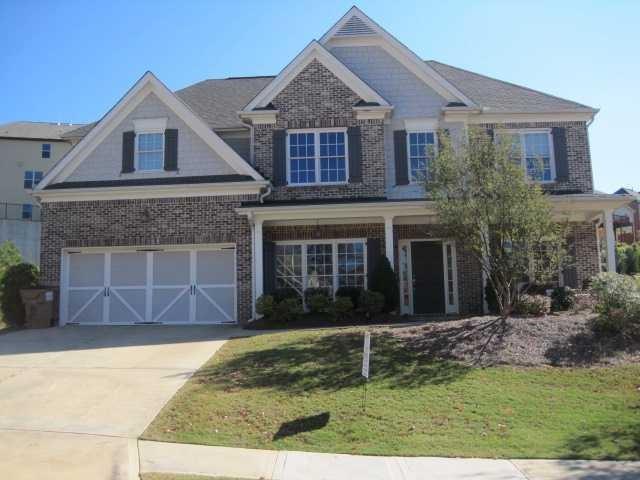 Beautiful home located in upscale Hillside Trace subdivision. Award-winning schools including Lambert High. The open and bright home offers hardwood floors throughout the first floor, a spacious kitchen with new appliances, an island, and a breakfast area that opens to a two-story living room with a wall of windows, built-ins, and a stone fireplace. Upstairs boast spacious bedrooms, lost with build-in cabinets can be studied. The home has an extra outside storage room for bikes and lawnmowers. NEW CARPET. MOVE IN READY. Convenient to everywhere.