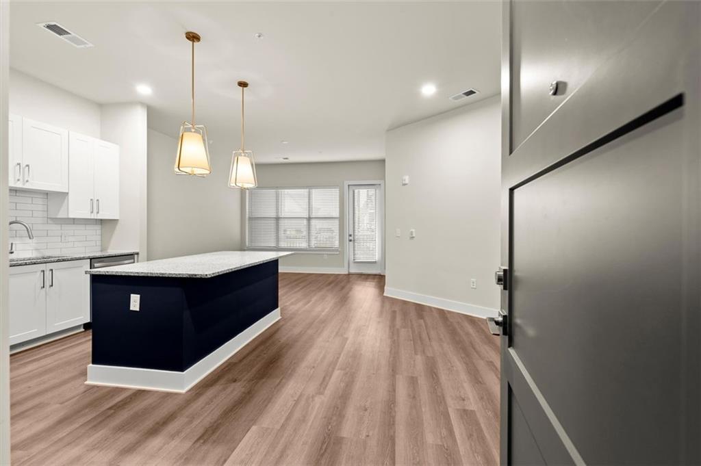 *NOW LEASING* *BRAND NEW CONSTRUCTION* *MOVE-IN SPECIALS* *55+ ACTIVE ADULT COMMUNITY.* Expand your life and start fresh at EVOQ East Cobb. This floor plan features a one bedroom, one and a half bathroom home. Discover the perfect blend of comfort, style, and community at EVOQ East Cobb, a vibrant 55 plus neighborhood designed for active adults and empty nesters ready for a fresh chapter. Nestled in beautiful Marietta, Georgia, this spacious home offers a pet-friendly garden-style setting with luxurious amenities that make every day feel special. Step inside and enjoy thoughtful features like a private balcony, high ceilings, and a full-size front-load washer and dryer, all designed to complement your lifestyle. Whether you are relaxing poolside after a water aerobics class, spending time with neighbors, or simply enjoying quiet moments at home with your furry companion, EVOQ East Cobb is where you can truly thrive. Here you will rediscover passions, explore new interests, and live life on your terms. This is more than just a place to live, this is where you belong. Ready to make your move? Let your next chapter begin at EVOQ East Cobb. Photos are representative of model home, and not actual home. Listing address is actual address of home.