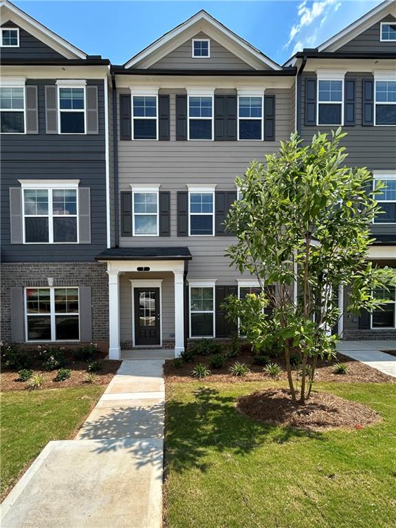 Brand New 3-Bed, 3.5-Bath Townhome in Prime Newnan Location! Be the first to live in this stunning new construction townhome in one of Newnan's most desirable, walkable communities! This 3-bedroom, 3.5-bath rental offers modern design, upscale finishes, and unbeatable convenience-just steps from grocery stores, restaurants, and the scenic LINC trail. The flexible layout includes a bedroom with a full bath on the main level, perfect for guests or a home office. Upstairs, you'll find two additional bedrooms, each with its own private bath. Highlights include: All new appliances-including washer, dryer, and refrigerator. Stylish upgrades: accent walls, ceiling fans, covered back deck Community amenities: walking path, pickleball court, basketball court Enjoy low-maintenance, modern living in an active, friendly neighborhood. This brand-new home won't last-apply today!