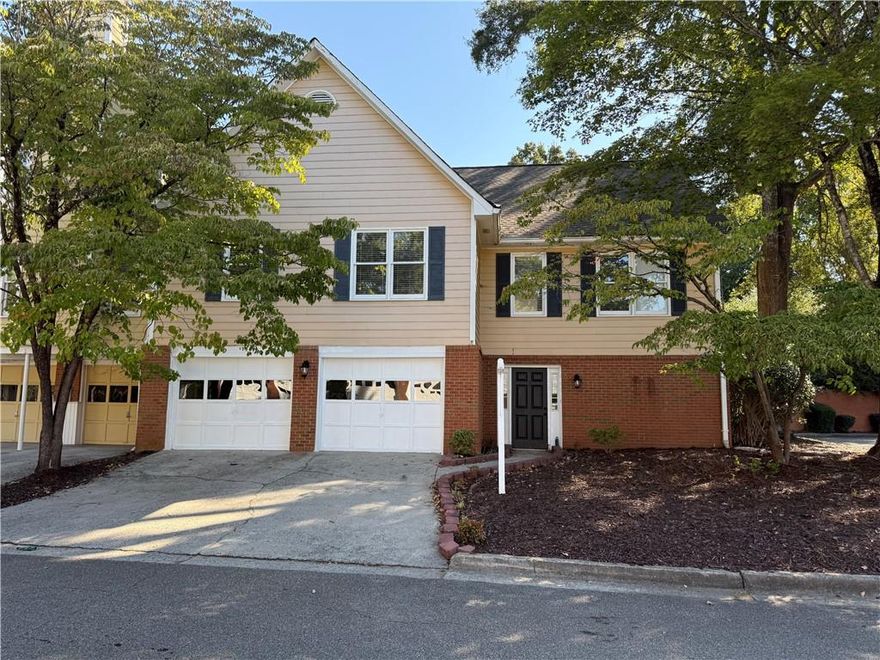 Beautifully renovated 3BR/3BA end-unit townhome in desirable Riversong subdivision (Johns Creek/Alpharetta). Dual Primary Bedrooms with one on the main level!  Open floorplan w/ fresh paint inside & out, remodeled kitchen & baths, new carpet, fixtures, hardware, landscaping & more! Owner’s suite features updated bath w/ double vanity & tiled walk-in shower. Oversized 2-car garage. Bright, landscaped corner lot w/ large front & backyard. Prime location near GA-400, GA-141, top schools, shopping & dining. Motivated sellers!  Renters are allowed.  No short term rentals.  Rooms have been virtually staged.