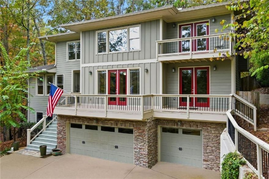 BREATHTAKING 5 BED/ 5 BATH MOUNTAIN RETREAT WITH MASSIVE RENTAL POTENTIAL! This luxurious 6,000+ square foot custom-built craftsman offers projected short-term rental revenue of $135,000 per year, making it an incredible investment opportunity in North Georgia or own your personal haven. Perfectly positioned to capture stunning lake and mountain views, this home combines comfort, accessibility, and timeless design. Inside, you'll find an open concept floor plan complete with two large living rooms (each with its own stone gas-start fireplace), oversized dining room, and chef's kitchen-complete with two sinks, an oversized island, high-end appliances, and views that stretch across the private backyard and treetops. Take the elevator (Yes-- there's even an elevator) upstairs  to the primary suite, which delivers true luxury with a private balcony, fireplace, sitting room, and a spa-inspired bathroom featuring dual vanities, a massive jetted soaking tub, a large walk-in shower, and an expansive closet. The finished terrace level adds even more flexibility with a full kitchenette, built-in dehumidifier, full living room, and a private bedroom suite-ideal for multigenerational living, guests, or an income-producing Airbnb setup. Accessibility is effortless thanks to the custom elevator, providing comfort and convenience on every floor. Need even more reasons to fall in love? This house comes with the PERFECT lifestyle living. Nestled within the gated Lake Arrowhead community, you (or your short-term renters) will get to enjoy golf, boating, multiple pools, pickleball, tennis, hiking trails, a marina, dog park, community events, and more. WHAT ARE YOU WAITING FOR? Whether you're seeking a full-time residence, multi-generational retreat, or high-performing short-term rental, this is exactly the home you've been searching for. Note that this home has been virtually staged/edited and that the square footage is an estimate based on public records and the original builder listing.