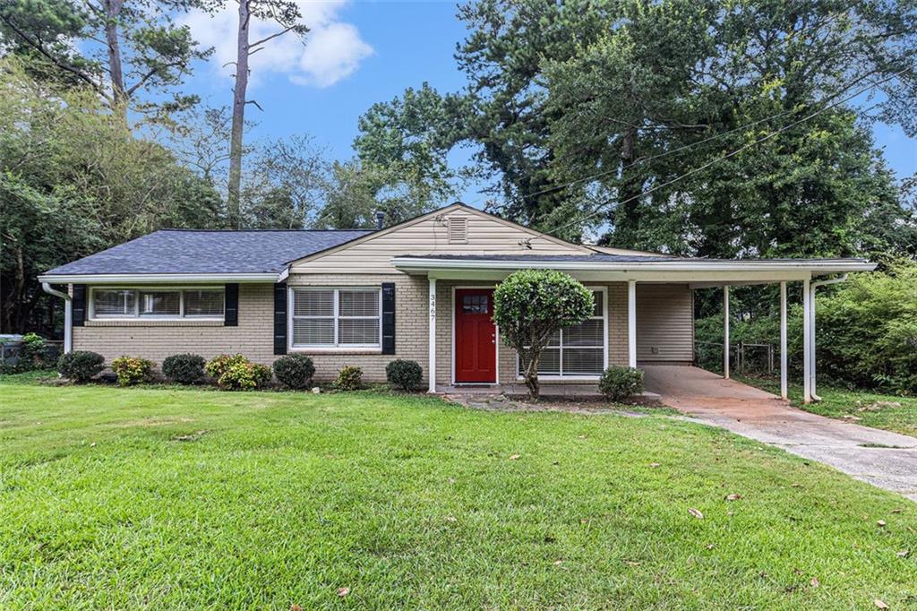 This ranch-style home features a 3/1 layout, a covered carport, and is in good condition. The property offers a spacious backyard, providing ample outdoor space for various uses. Its single-level design adds to the overall accessibility and functionality.