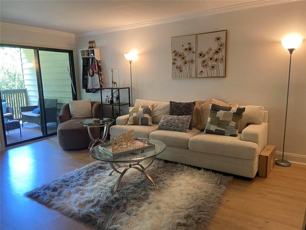 This 2 bed 2 bath condo is completely furnished and convieniently located close to the corner of Hammond Dr. and Peachtree Dunwoody Rd. It is walkable to 3 MARTA stations, Northpoint Hospital, Perimeter Mall, Starbucks, Publix and a lot more! Owner will include all utilities (wifi/trash/electric/gas/water/hoa/gym/pool/tennis) upon request. Condo has a covered back deck with ALL NEW Hardwood flooring, new stainless steel appliances, warm fire place, new tile in bathrooms, new toilets and paint. Awesome covered deck overlooking private lake, just a peaceful property with an amazing location! Can rent Unfurnished for $2500 Furnished for $2750 and Furnished with Utilities included for $2900. Owner is a licensed Real Estate Agent #433256. Listing agent is co-owner #328215
