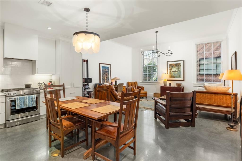 This stylish 1-bedroom ADA loft in the Textile Loft building of Serenbe’s Grange Hamlet offers modern comfort and natural charm. Featuring an open floor plan with an eat-in kitchen and living room, the space is bathed in natural light from large windows and enhanced by soaring ceilings. Located within a short distance to Serenbe’s renowned wellness amenities—including spas, restaurants, shops, and Serenbe Farms for fresh produce—this loft is ideal for those seeking a connection to both community and nature. Enjoy access to over 20 miles of scenic nature trails surrounded by protected forest views. Additionally, this loft also features an assigned covered parking spot in the Textile Loft garage.