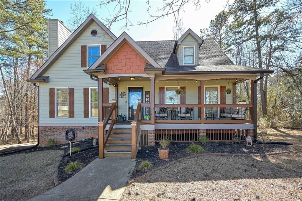 Welcome to 9001 E Carroll Road, a beautifully appointed 4BR/3.5BA home nestled along the scenic St. Andrews Golf Course - perfectly positioned to enjoy the view without the worry of stray golf balls in your yard or windows. Inside, you'll find rich hardwood floors, a grand family room with a stacked-stone fireplace, and a gourmet kitchen with granite counters, stainless steel appliances, and a sunlit breakfast area. The main-level primary suite features a custom two-person shower and elegant finishes. The terrace level offers a stylish retreat with bonus living space, a bedroom, and full bath. Outdoors, unwind on the oversized deck surrounded by nature. Concrete siding, newer roof, and insulated windows complete this well-loved home. Homes of this caliber - and location - are few and far in between. Schedule your private showing before it's gone!