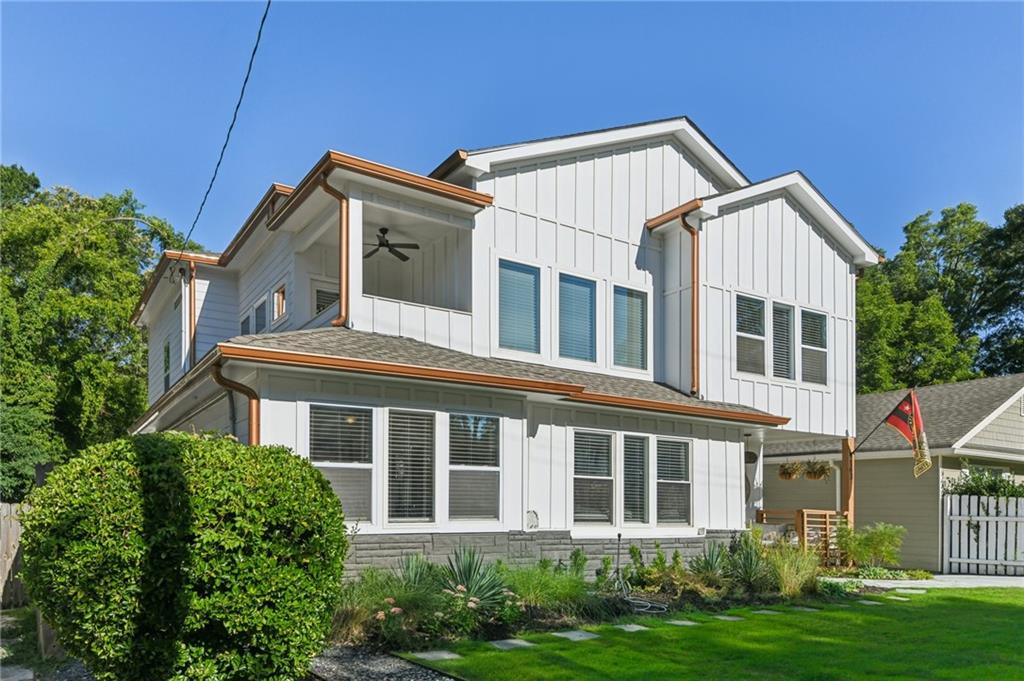 Price Reduced! Best Value for the Neighborhood! Nestled on a quiet street in the sought after Kirkwood neighborhood. Built just 4 years ago, this like new modern/farmhouse is a must see! Step into the foyer entry and be immediately captivated by the designer details this home offers. Starting with the built-ins surrounding the double sided fireplace, the two story great room and the floating ceiling. A chef's kitchen that offers that sleek modern feel with quartz countertops, large waterfall island, stainless steel appliances and two pantries. Step out onto the covered rear deck to enjoy family gatherings, morning coffee or to watch the kids paly in the backyard. The second level begins by captivating you with the 20ft feature wall that takes you to the loft, where you can enjoy reading your favorite book or binging netflix.
The oversized master suite offers separate custom closets. The master bath gives you that sleek and modern spa like feel with quartz countertops and a large soaking tub and large shower. Step out onto the covered second story patio and watch the sunrise or enjoy evening wine. There are so many custom features in this home from the lighting, accent walls, hidden storage, and much more that you don't want to miss. There is even electric vehicle charging in the detached garage. Short walk to downtown Kirkwood, which offers shops, restaurants, entertainment and more. Best Value in the Neighborhood! $10,000 Seller Rate Buy Down. $8,000 Lender Credit Towards Closing Cost When Using Preferred Lender.