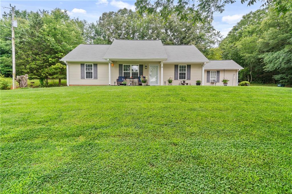 Located on a quiet road in Calhoun, 235 Tucker Hollow Road offers a blend of functional living and comfortable outdoor space on a 0.69-acre lot. With 1,144 square feet, this 3-bedroom, 2-bathroom home features a smart single-level layout that’s practical for everyday living.
Inside, the open living and dining areas create a natural flow, with updated flooring and a neutral color palette that make the space feel bright and flexible. Large windows enhance the main living areas with natural light, and the layout supports both relaxed and efficient living.
The galley-style kitchen includes ample cabinet storage and durable surfaces, with an efficient layout that connects smoothly to the dining space. A nearby laundry/mudroom offers a practical entry point to the backyard and extra space for organization.
The primary bedroom includes a private en suite bath and walk-in closet, offering a comfortable personal space. Two additional bedrooms and a full hallway bath complete the home’s interior, offering flexibility for guests, work-from-home needs, or hobbies.
Step outside to enjoy the covered back patio, an ideal spot for warm weather evenings or weekend projects. A storage shed adds functional outdoor space, and the flat yard provides plenty of room for gardening, recreation, or simply enjoying the setting.
For those looking for a well-maintained home in a quiet location with usable outdoor space, 235 Tucker Hollow Road is ready to show.
Schedule your tour today and see the value this Calhoun home has to offer.