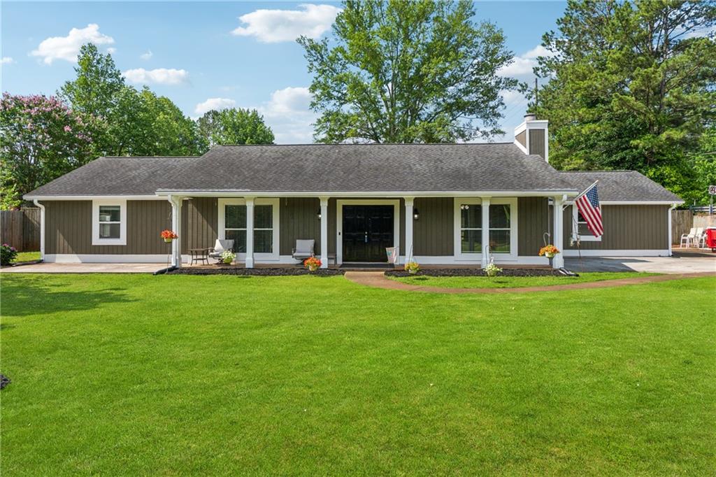 Large ranch home for sale in the great East Cobb/Marietta area. This home offers a large kitchen with breakfast area, island, granite countertops, and stainless-steel appliances. The home also has a separate dining room, updated bathrooms, large secondary bedrooms, fireplace with gas logs, two car garage, extra parking behind the garage, large laundry room, his and her walk-in closets, vaulted ceilings, and extra storage. The home sits on a large lot with a storage shed, large level front yard, great fenced in backyard, front porch, back patio, and is very close to the pool and clubhouse. The sale of the property includes washer/dryer, all kitchen appliances, ceiling fans, window blinds, and the T.V. & mount in the family room. The property is located just minutes away from top rated schools, parks, shopping, and dining. Must See!!